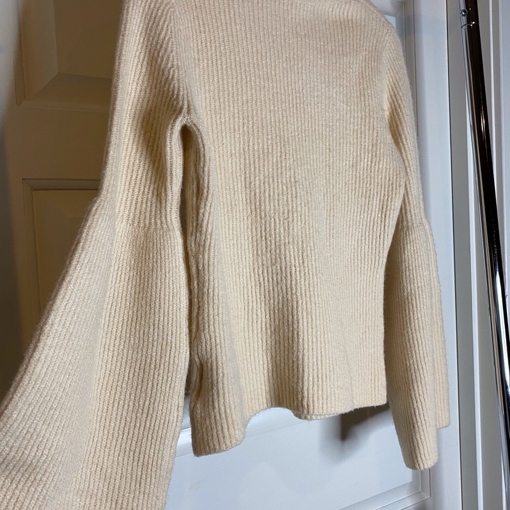 Cream turtleneck sweater